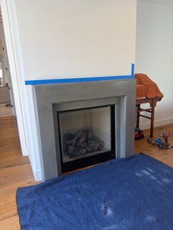 Contemporary architectural fireplace concrete mantel