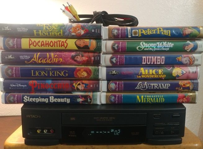 VCR PLAYER WITH 12 DISNEY MOVIES