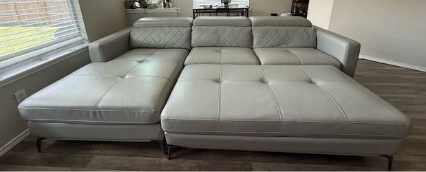 Gray Leather Sectional Sofa and Ottoman