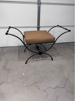 Wrought iron vanity bench.