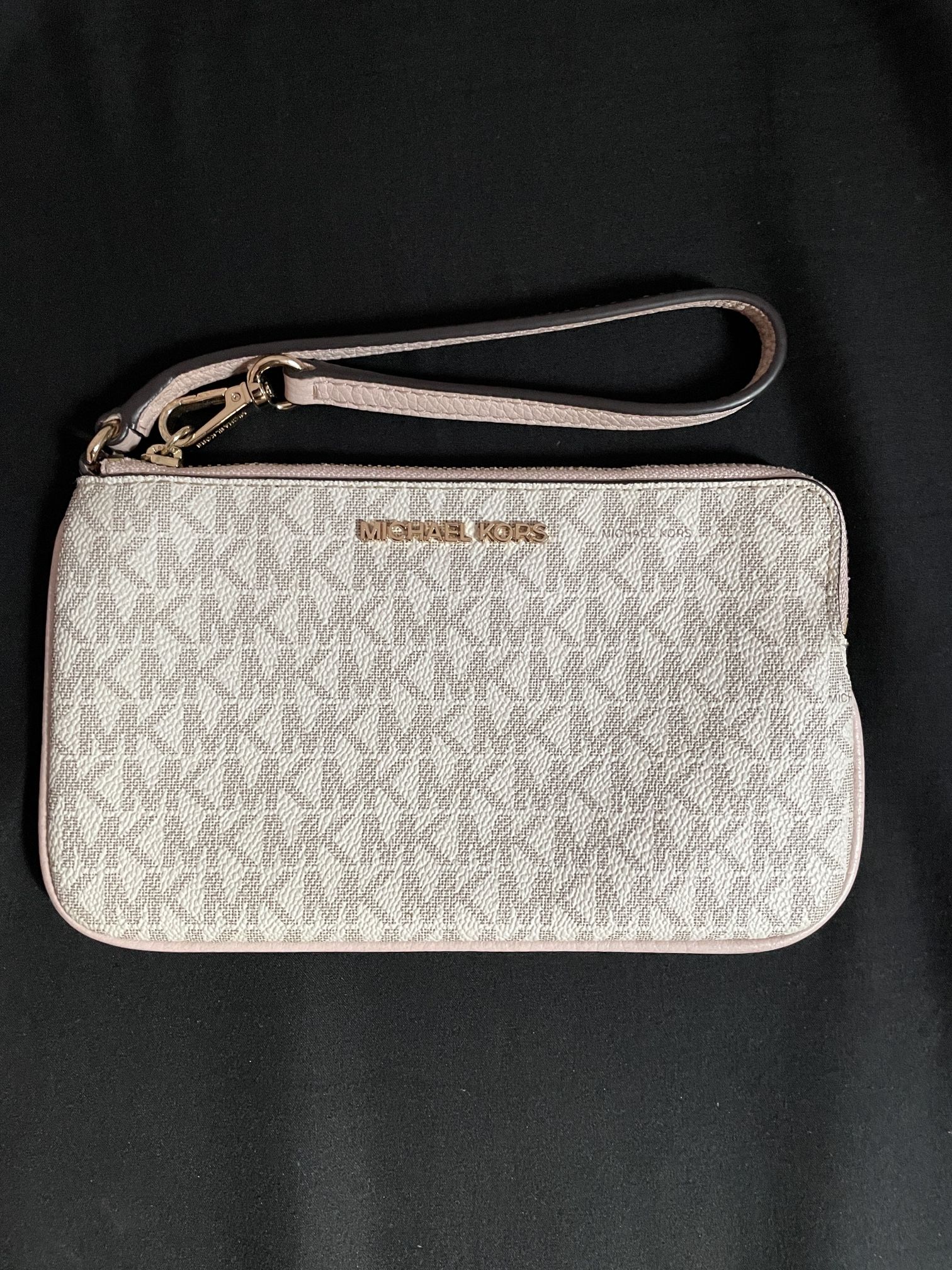 Pink and White Michael Kors wristlet wallet