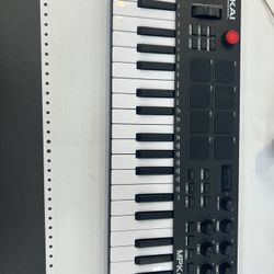Akai Professional MPK Mini Plus - USB MIDI Keyboard Controller with 37 Mini Keys, 8 MPC Pads, Sequencer, MIDI/CV/Gate I/O, Music Production
