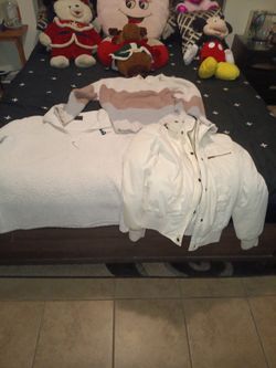 Texas jacket and a white jacket and a sweater
