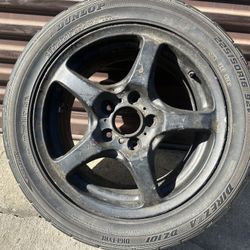 One Honda S2000 16 inch stock rim with an old tire 5 on 114 