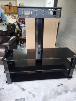 3 dark glasses shelves, metal mount
56" Long