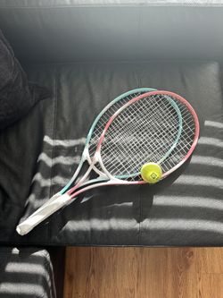 2 tennis rackets for adults and 1 tennis ball