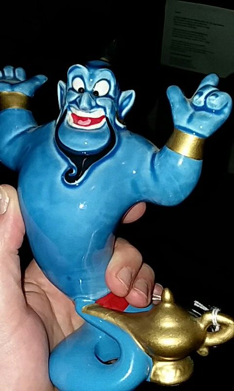 Disney genie statue