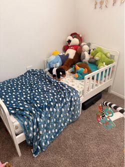small toddler bed and mattress