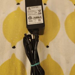 J. POWER AC/DC ADAPTER