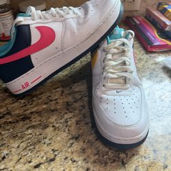 Mens 10.5 Air Force 1 '07 Low sneakers in a White, Racer Pink, and Thunder Blue colorway,