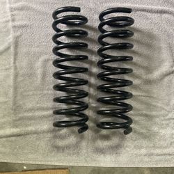 NEW Moog Coil Springs .  - FRONT-