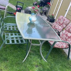 Table And 4 Chairs  And  4 Cushions 