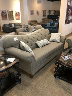 Brand new tufted sofa tax included free delivery