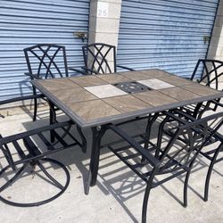 Patio Set Tiled Table 38” X 67” & 6 Metal Based Chairs Delivery Avail