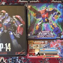 Optimus Primes (Missing Link C-01, Legacy Armada, Black Mamba XP-14)