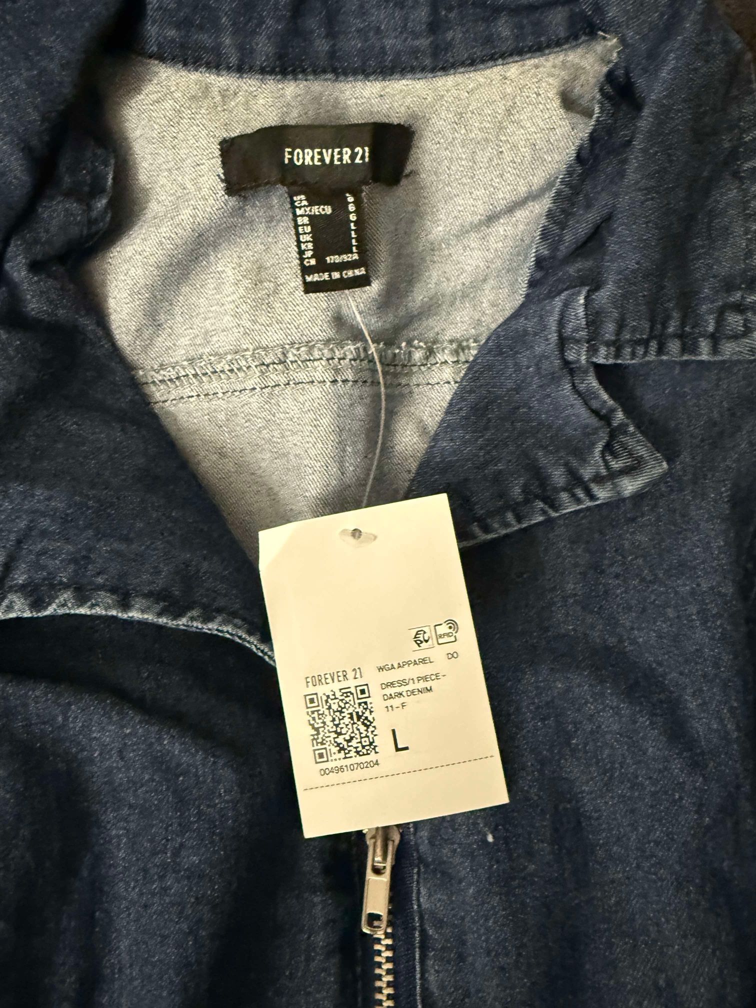 New with Tags. Dark blue denim jumpsuit Size L