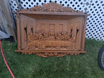 hand-carved wood relief sculpture depicting The Last Supper