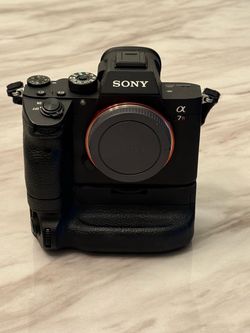 Sony A7Rlll w/ Sony Vertical Grip VG-C3EM, and 3 extra batteries.