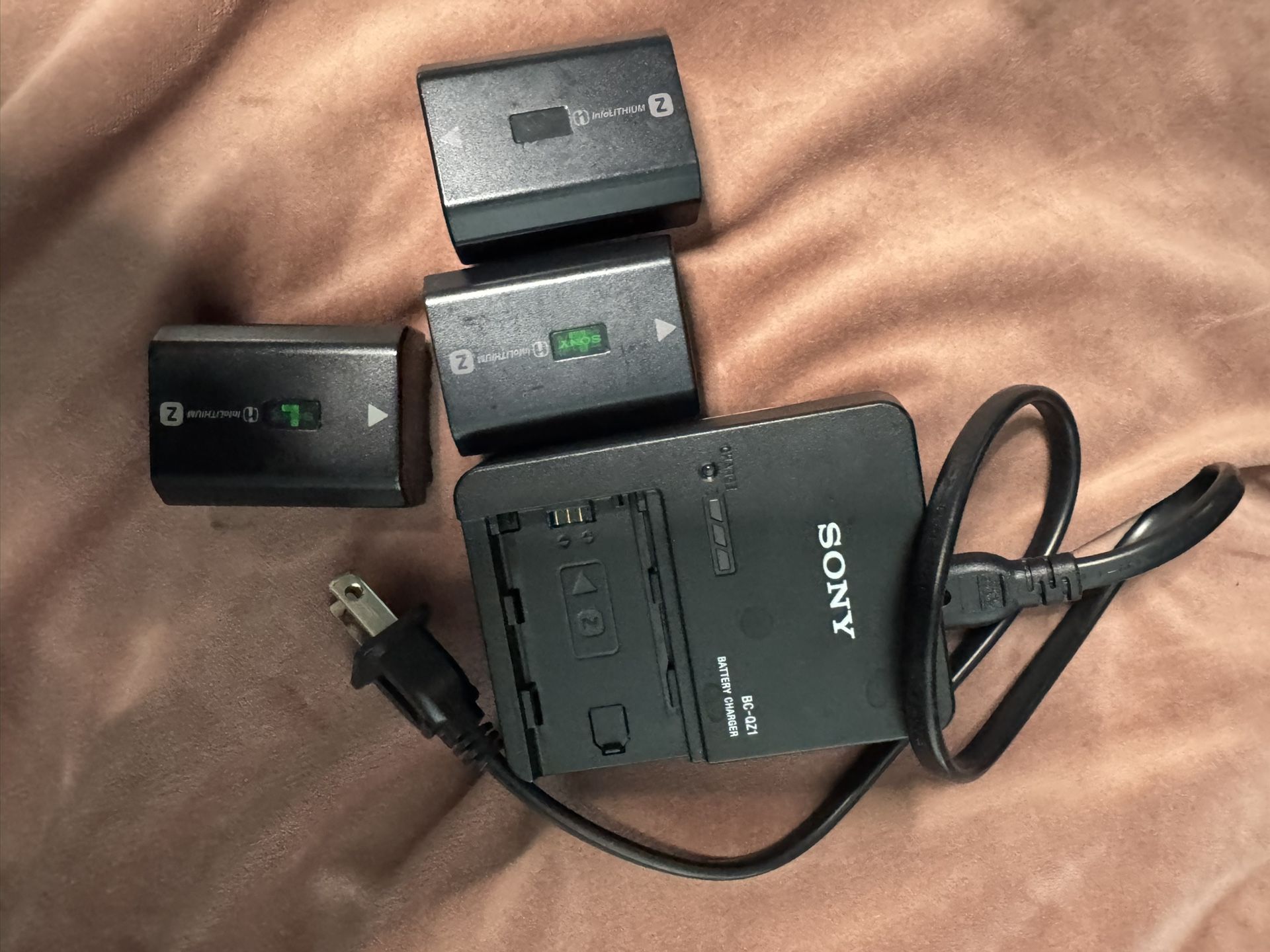 Authentic Sony Battery Charger And 3 Sony Batteries