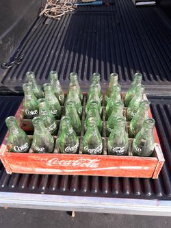 old coke crate with bottles