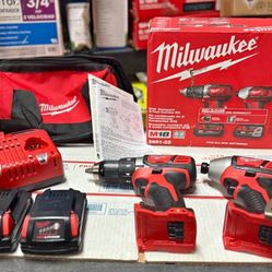 MilwaukeeM18 18V Lithium-lon Cordless Drill Driver/Impact Driver Combo Kit W/ Two 1.5Ah Batteries
