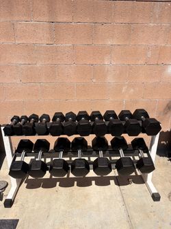 American barbell hex rubber coated dumbbells in good condition  includes pairs of 5-10-20-25-30-35-40-45-50 pounds please note that one of the 10 poun