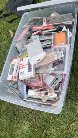 Bin Of Chargers, Phone Cases, And Ear pod Cases
