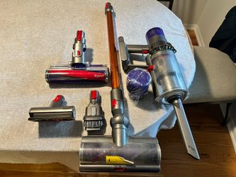 Dyson V10 Cyclone Cordless Vacuum with accessories