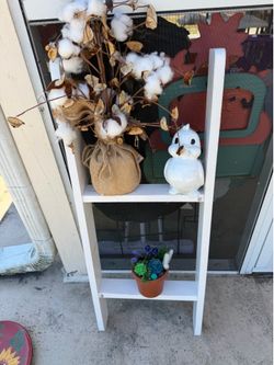 Small ladder shelf to lean against a wall or in a garden items on the shelf are not included, but can be purchased separately