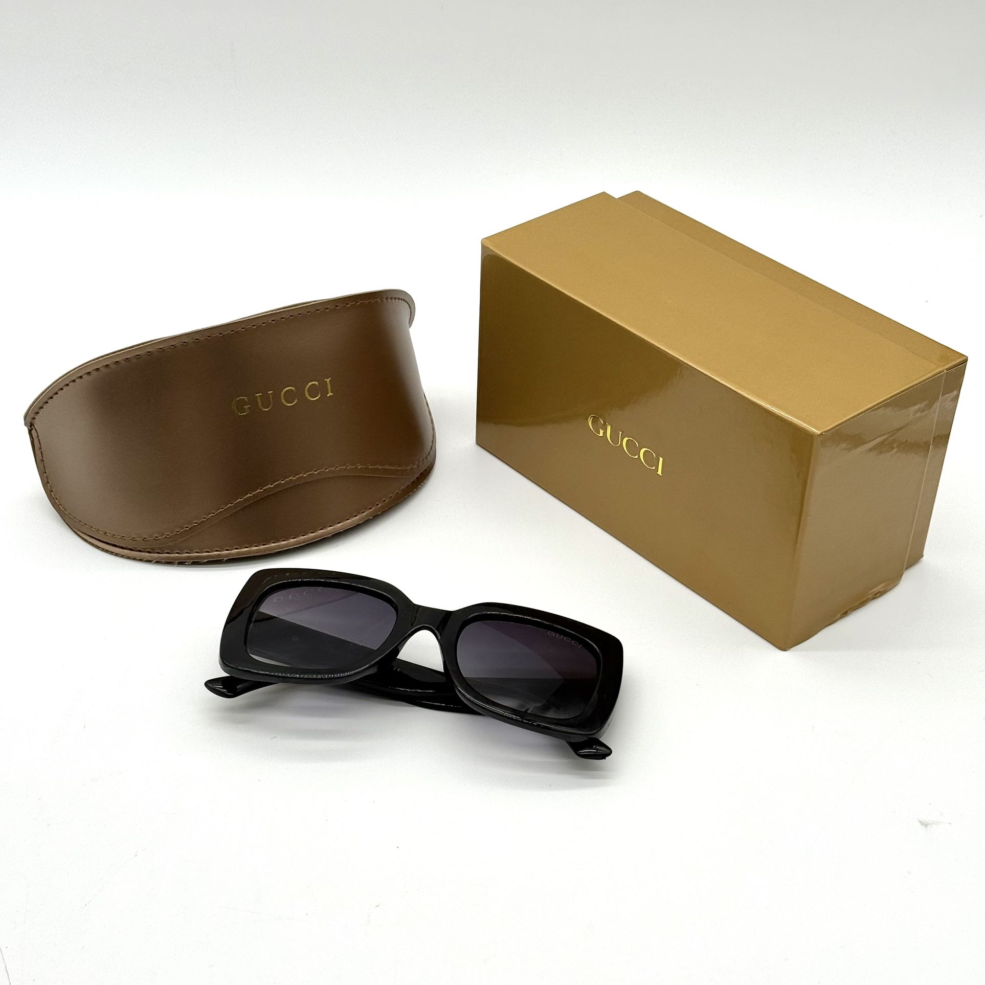 Gucci Women’s Sunglasses Oversized Black Frame With Purple Infused Lens