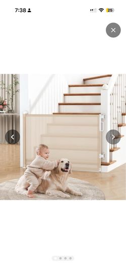 Retractable baby gate
