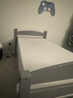 Twin bed and Ashley furniture memory foam mattress