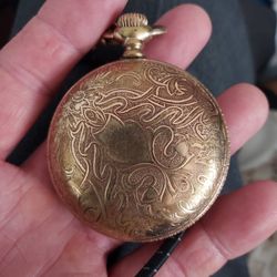 Gold pocket watch