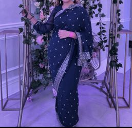 Teal Saree With Gold Embellishments