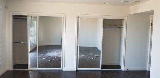 Sliding closet mirror doors