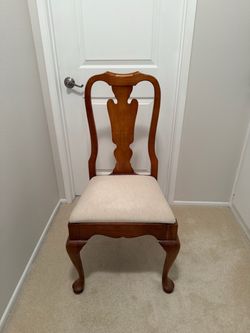 Set of six Pennsylvania House solid wood chairs with upholstered neutral seats.  Excellent condition
