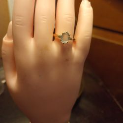 Aquamarine 14 Karat Gold Ring With A Small Diamond On Each Side Of The Stone The Ring Is Stamped 14 Karat Yellow Gold The Stone Is A Real Aquamarine S