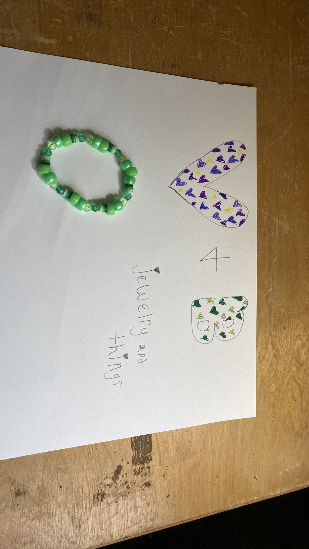 Black, White, And Green Bracelets