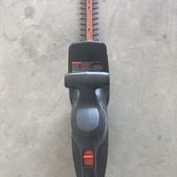Hedger Trimmer-Black and Decker Plug-in & Corded Hedger Trimmer. Model: TR017