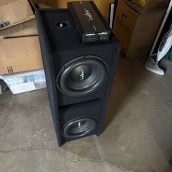 2 12 Inch Skar Subs With Box. And Also 1500 W Skar Amp
