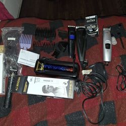 Men, hair clippers 2 New/2 used & Norelco  I don't have the charger cord for 5 Clippers Total 