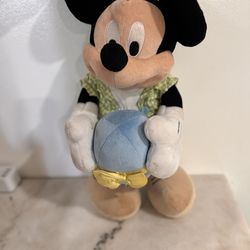 Easter mickey plush holding egg