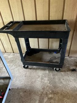 Two working carts one plastic the other metal $100 for both