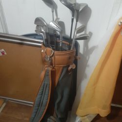 Golf Clubs With Bag And Punching Bag With Chains And Straps