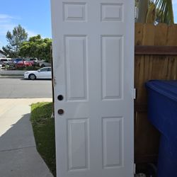 Solid Exterior Door With Hinges