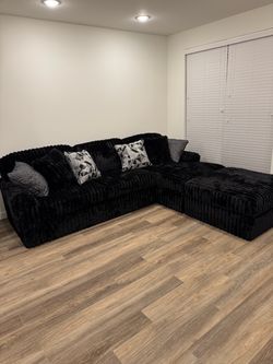 Ashley’s furniture black soft couch