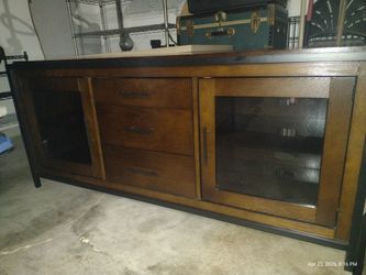Solid cherry wood television credenza with smoked glass shelving