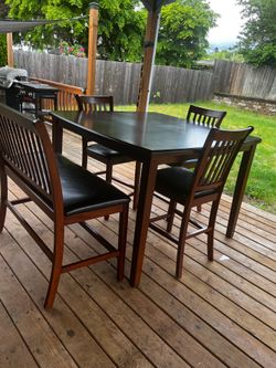 Good quality table with bench and 3 chairs