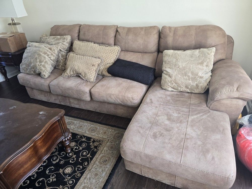 Tan L-Shaped Sectional Couch