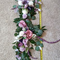 2 Artificial Flower Garland wreaths for table decor

Condition is used twice
$120 for longest wreath
$110 for shorter

Measurement of each arrangement